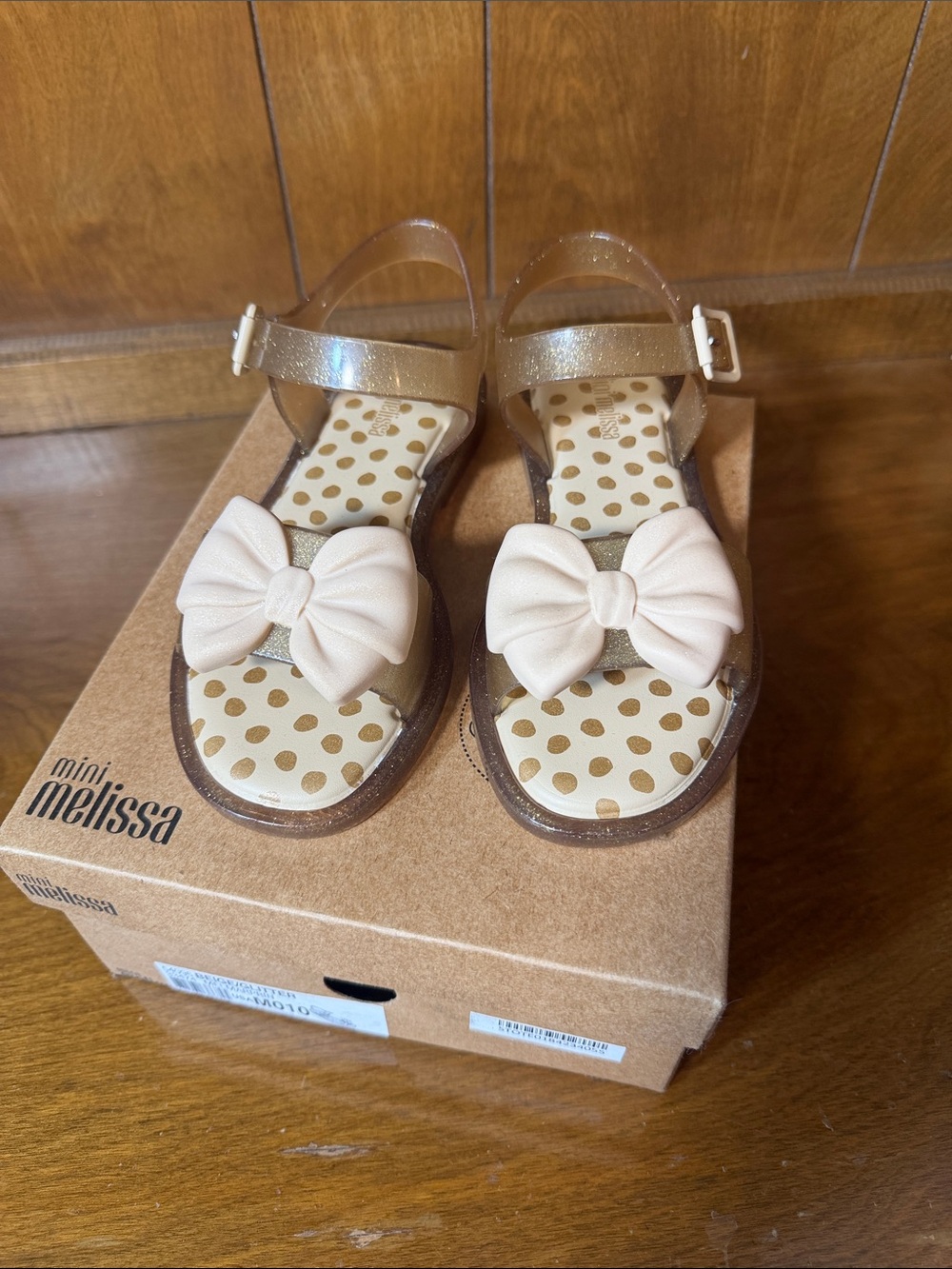 Mini Melissa Gold Jelly Sandals with Cream Bow